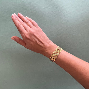 Brazalete Telar Dorado Delgado Difuminado Gris Traslucido